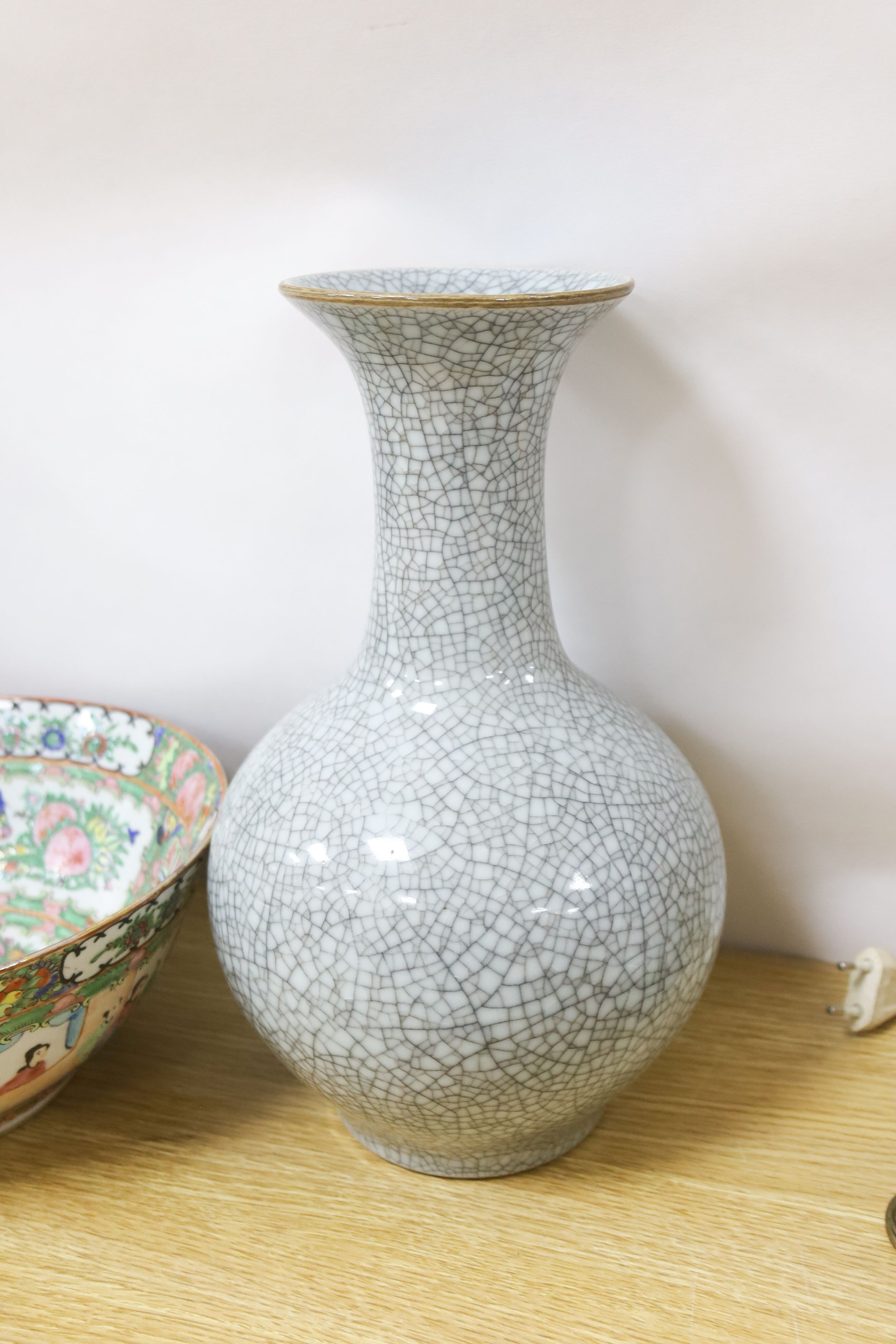 A Chinese famille rose sleeve vase, a similar bowl and a crackle glaze vase, 19th century and later, 31cm
